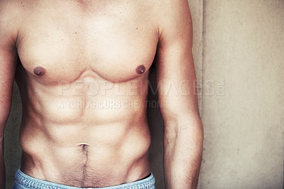 Buy stock photo Body, closeup and fitness man with abs, muscle or workout motivation on wall background. Chest, stomach and zoom on topless male model pose with muscular torso, pride and training, goals or results