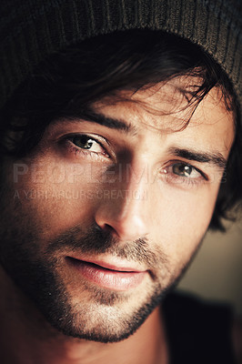 Buy stock photo Portrait of an attractive and ruggedly handsome man wearing a woolen cap