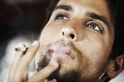 Buy stock photo Thinking, smoke and man with a cigarette, ideas and thoughtful with decision, choices and wonder. Male person, human and model smoking, thoughts and cannabis with a guy, break and relax with fantasy
