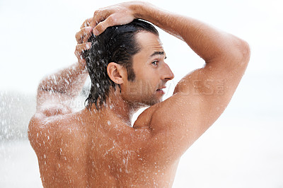 Buy stock photo Clean, back view of a man in the shower and health wellness indoors. Cleaning in bathroom, muscular or wellbeing and rearview of wet male person showering for refreshing hygiene protection or washing