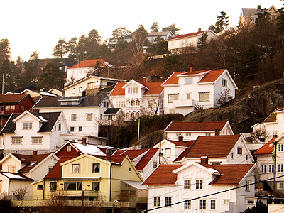 Buy stock photo Facade, houses and village in Norway, Europe or tourism, travel or vacation. Exterior, wood home or Scandinavian buildings outdoor, vintage architecture or traditional landscape in retro neighborhood