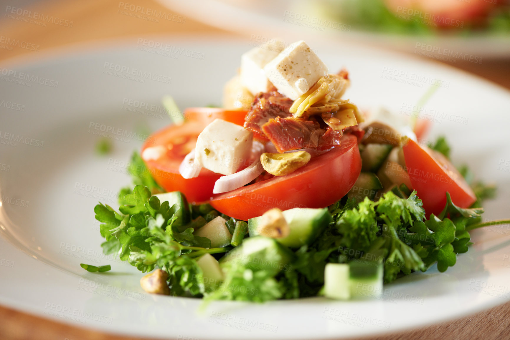 Buy stock photo Background, salad and healthy plate of food for lunch, dinner and nutrition for detox, diet or eating in cafe. Closeup, vegan cuisine or dining in restaurant for meal of leafy greens, tomato and feta