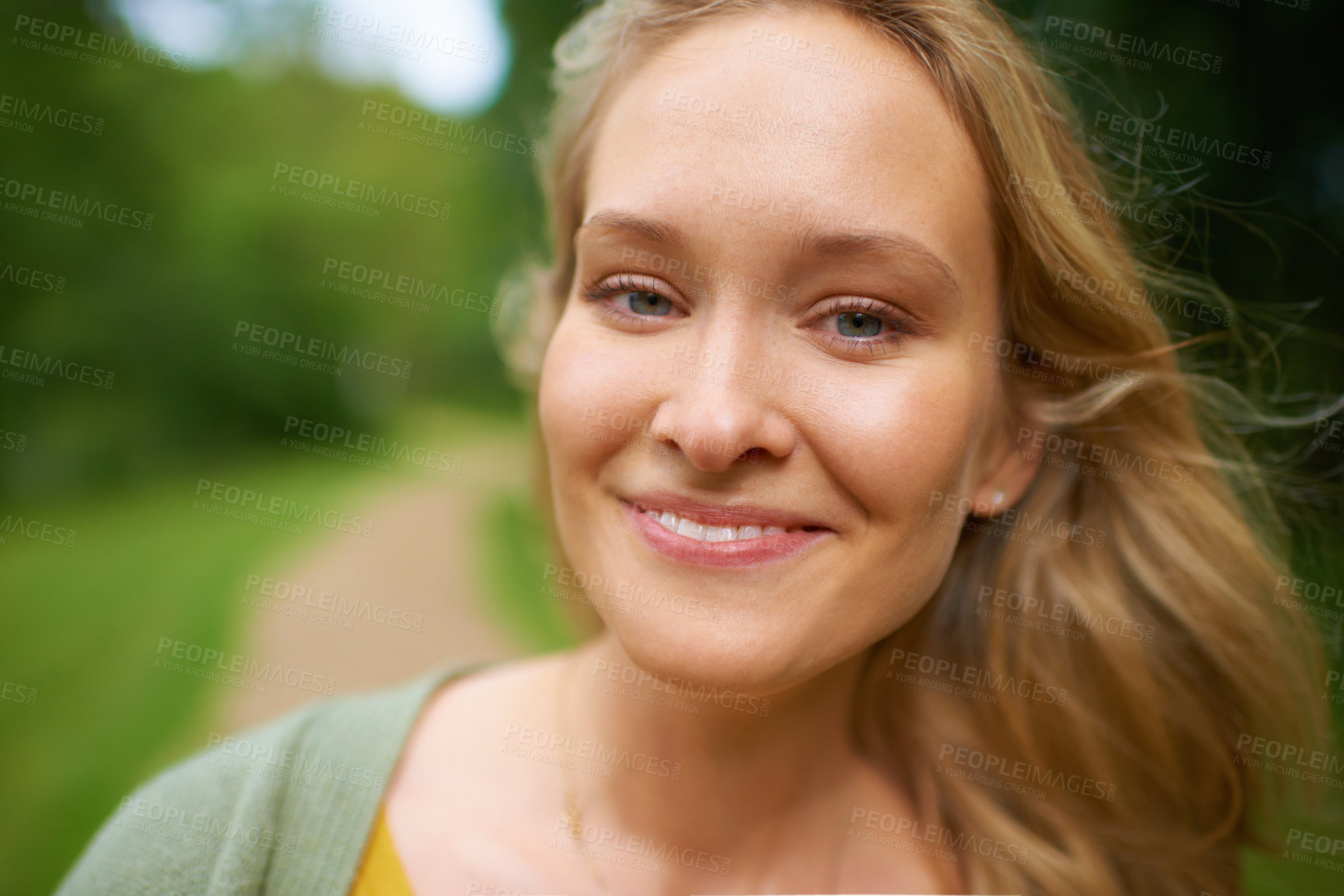 Buy stock photo Portrait of an attractive young woman in nature