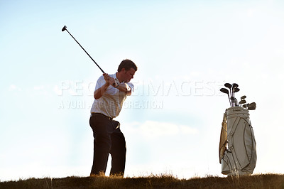 Buy stock photo Stroke, golf and man with driver on course outdoor for training, workout or fitness on blue sky mockup space. Golfing, club and person swinging for game, competition or exercise, sports and wellness.