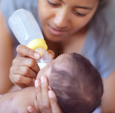 Buy stock photo Mom, baby and feeding milk from bottle for nutrition, health and wellness. Formula, newborn and mother feed child for early childhood development, growth and healthy diet, food and lunch at home.