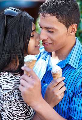 Buy stock photo Couple, love and ice cream with face in hug, youth and care in park by countryside. Mexican, man or woman on honeymoon with dessert, vacation and date in marriage with kiss and happy in nature
