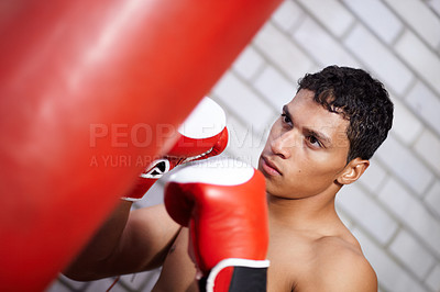 Buy stock photo Sport, punching bag or training man, boxer or fighter serious for martial arts contest, kickboxing competition or club challenge. MMA battle, gym equipment or warrior practice skills for boxing fight