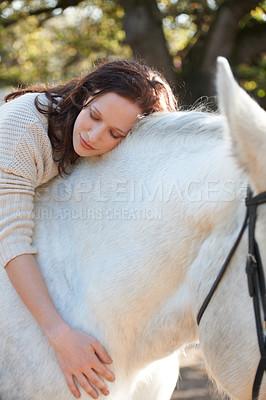 Buy stock photo Nature, love and woman laying on her horse on an outdoor farm for sports racing. Smile, happy and young person from Canada with her equestrian animal or pet in countryside ranch for adventure.