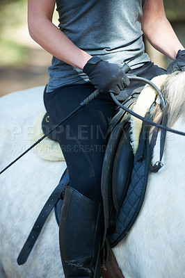 Buy stock photo Saddle, horse riding or woman in countryside outdoor with rider or jockey for recreation or wellness. Exercise, hands or closeup of athlete with a healthy pet animal for training or support on farm 