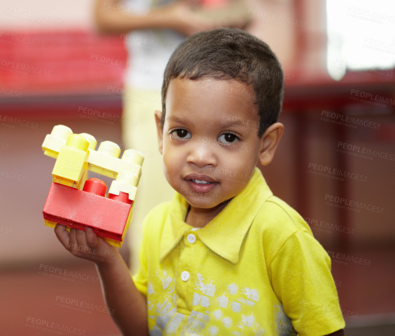 Buy stock photo Boy, portrait and building blocks in classroom for development, scholarship and games at kindergarten. Happy student child, plastic toys and smile for education at academy, school or growth in class