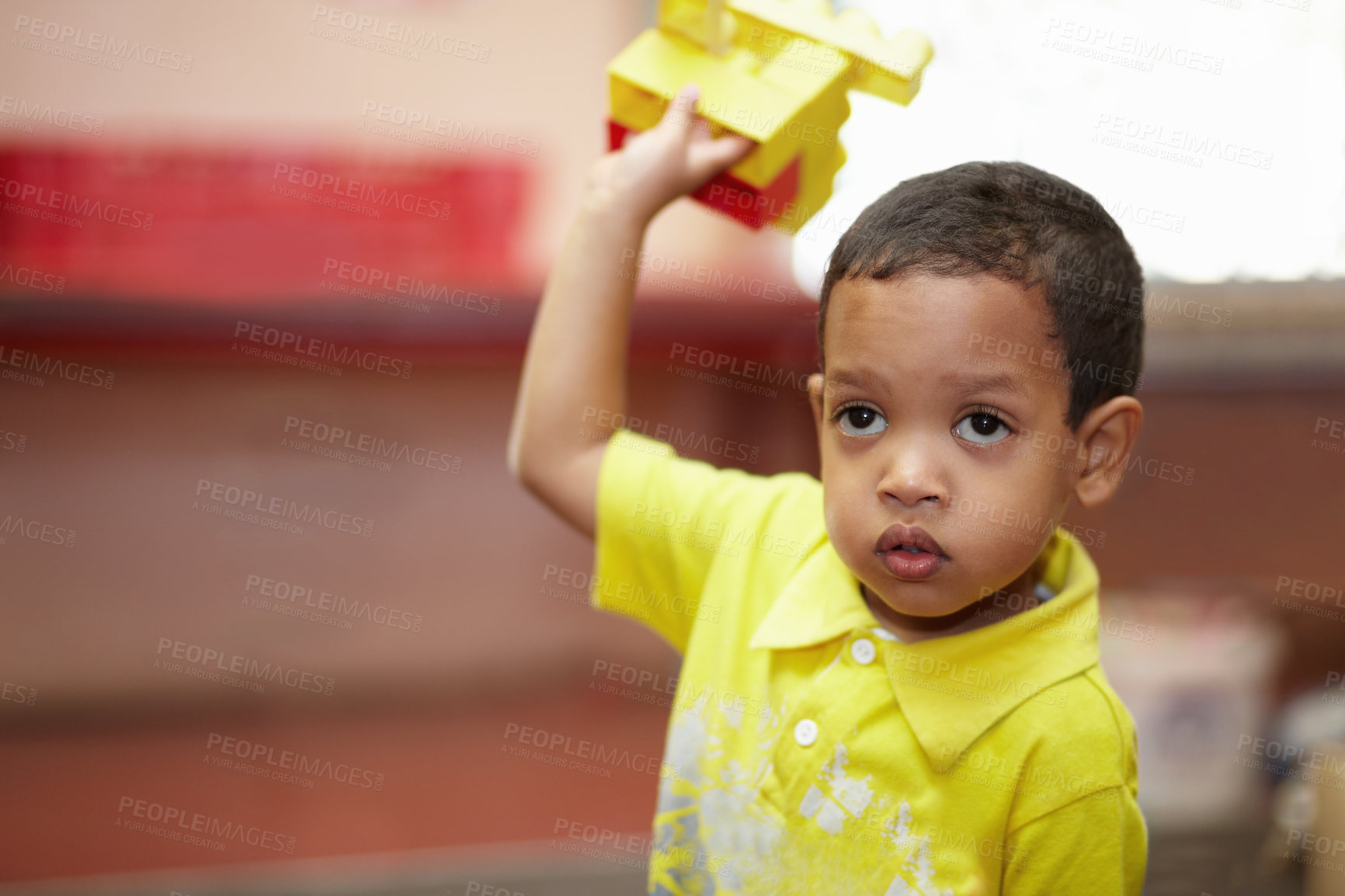 Buy stock photo Boy, education and building blocks in classroom for development, scholarship and thinking at kindergarten. Happy student child, plastic toys and playing with idea for learning, academy or preschool
