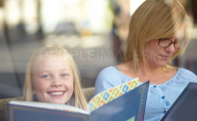 Buy stock photo Reading, portrait and mother with child in bookshop with smile, learning and relax in knowledge. Storytelling, happy mom and girl in library together with story, fantasy books and education in window
