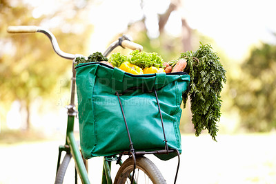 Buy stock photo Cropped image of a bag of vegatables on a bike