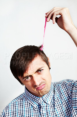 Buy stock photo Portrait of a digruntled man with bubblegum in his hair