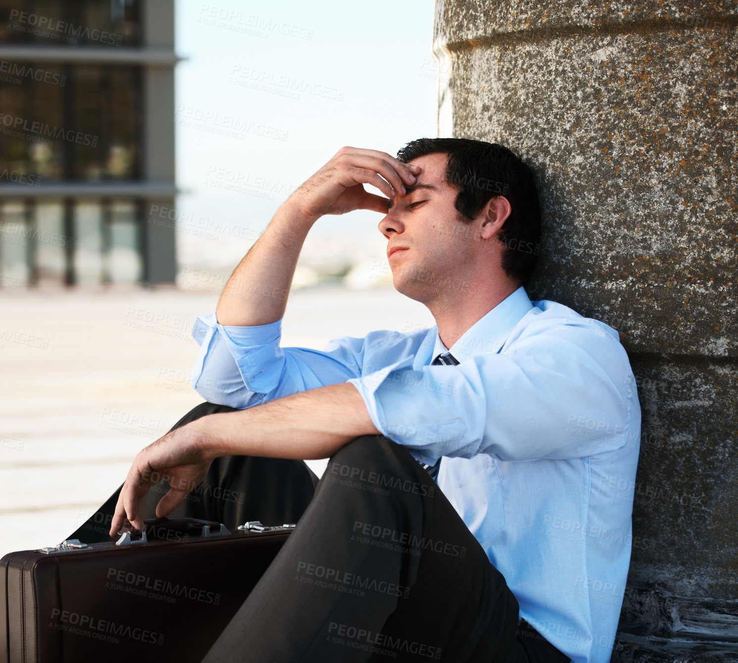 Buy stock photo Businessman, headache or outdoor with stress, depression and anxiety on roof of building for crisis. Professional, person or employee with suitcase, mental health or migraine for problem or suffering