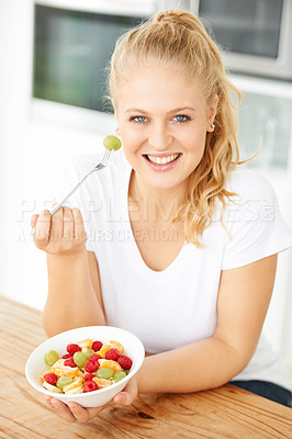 Buy stock photo Fruit, bowl and portrait of woman eating healthy lunch or breakfast meal or diet in the morning in her home kitchen. Nutrition, health and vegan person smile and happy for salad, food and self care