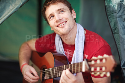 Buy stock photo Man, camping and relax with music on guitar in tent, outdoor  or holiday in nature. Musician, guitarist and creative person playing song on instrument about hiking adventure and vacation in summer 