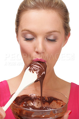 Buy stock photo A young blonde woman enjoying a bowl of chocolate pudding