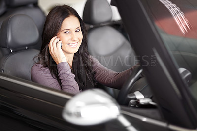 Buy stock photo Phone call, driving and portrait of woman in a car for transport in discussion with technology for communication. Happy, smile and young person riding a vehicle on mobile conversation with cellphone.