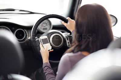 Buy stock photo Phone, driving and woman in a car at a dealership networking on social media, mobile app or the internet. Technology, purchase and back of female person riding a vehicle and scroll on cellphone.