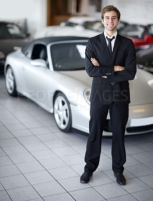 Buy stock photo Cars, salesman in portrait at dealership and arms crossed with smile, transport and sales job. Worker, vehicle for driving and professional man with career, happiness and selling luxury automobile