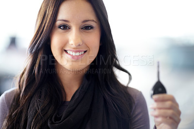 Buy stock photo Key, smile and portrait of woman in a dealership buying a new car for luxury transportation. Happy, driver and young female person from Canada purchase a vehicle in a showroom, store or shop.