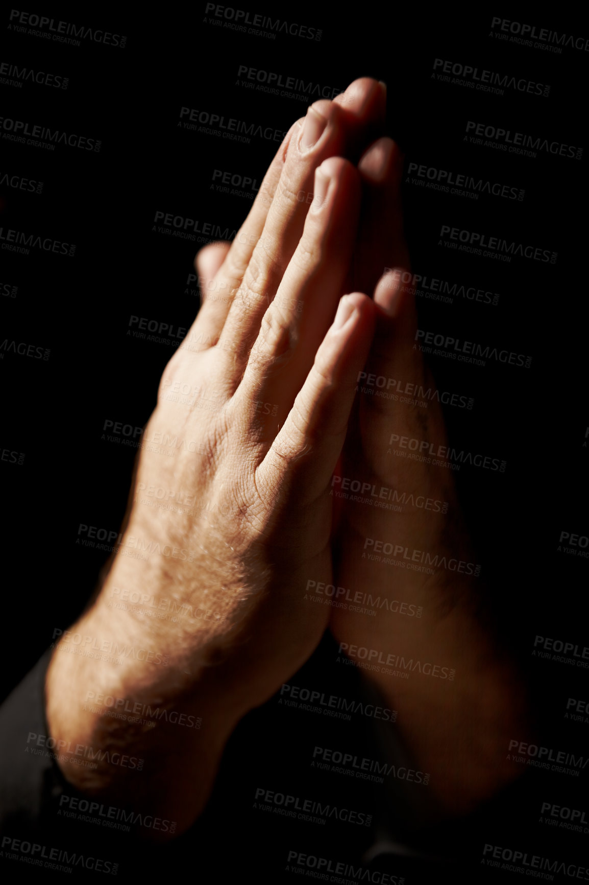 Buy stock photo Prayer, hands and black background for faith, hope and religion or asking for help with mental health or support in studio. Praying emoji, christian person and God, holy spirit or peace in dark room