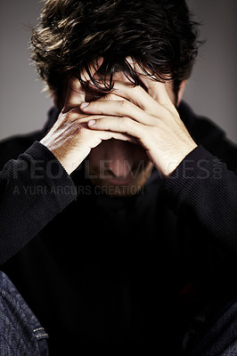 Buy stock photo Man, sad or depression with mental health and thinking about pain, stress or burnout with financial crisis and life. Hands, trauma in studio and bankruptcy with debt and disaster on grey background