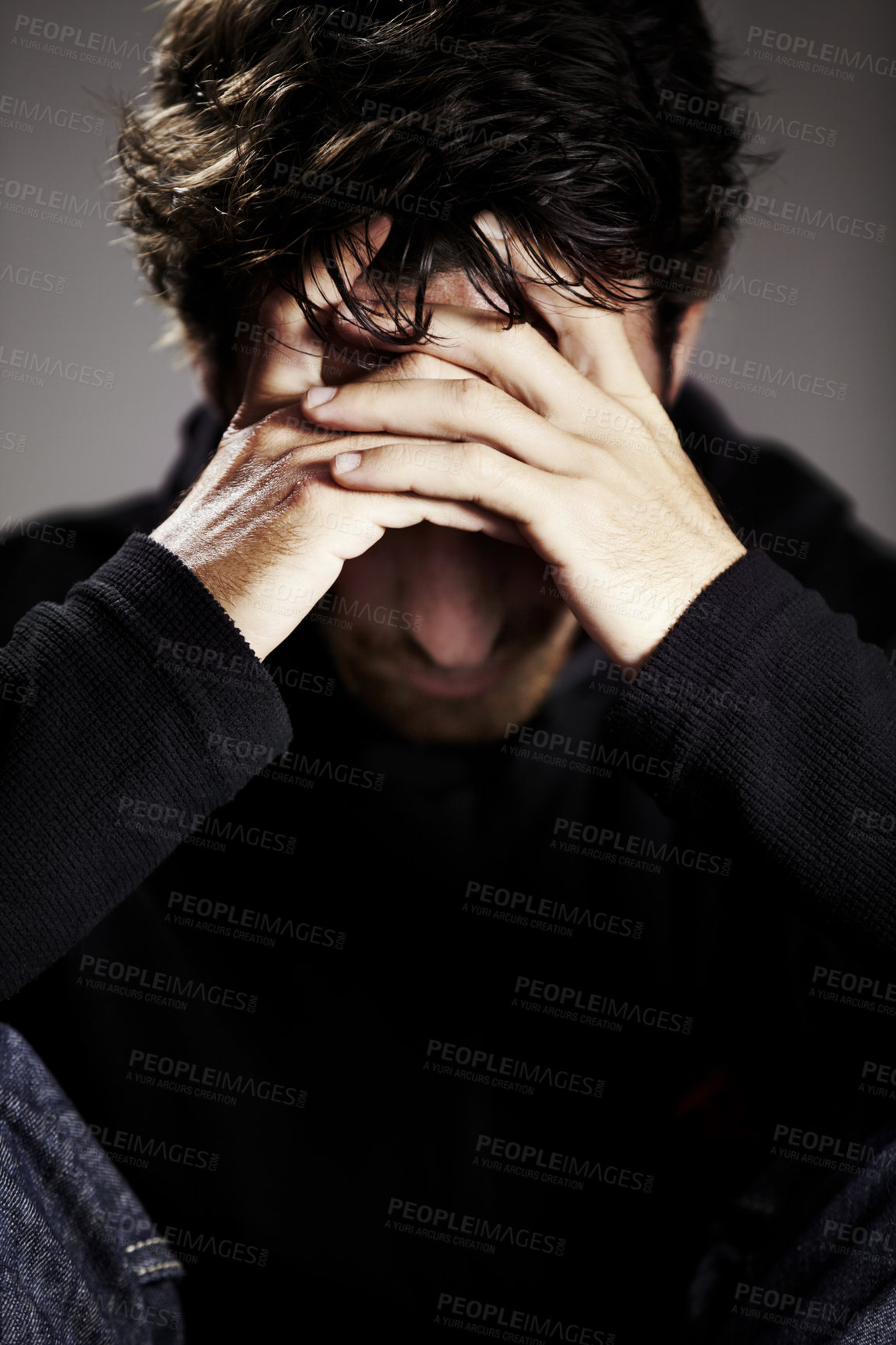 Buy stock photo Man, sad or depression with mental health and thinking about pain, stress or burnout with financial crisis and life. Hands, trauma in studio and bankruptcy with debt and disaster on grey background