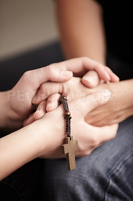 Buy stock photo Helping hand, prayer together with beads and worship for religion, trust or spiritual hope. Support, counseling and people in Christian meeting for faith, praise or empathy with rosary, cross and God