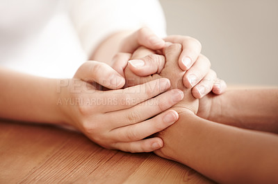 Buy stock photo Holding hands, life coach and people with care and community, showing empathy and love with kindness. Comfort, hope and a person giving helping hand for mental health, trust and forgiveness together