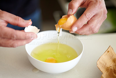 Buy stock photo Egg, food and hands cooking breakfast in the kitchen for hunger, preparation and morning routine. Diet, healthy and a man with eggs for protein, lunch and preparing a meal at home for health