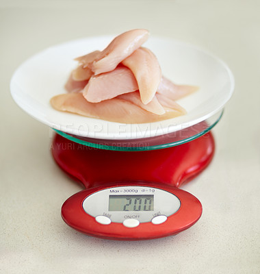 Buy stock photo Protein, nutrition and chicken breast on a scale in studio from above on a table in the kitchen for health or wellness. Food, meat and diet with healthy organic lunch on a plate to measure the weight