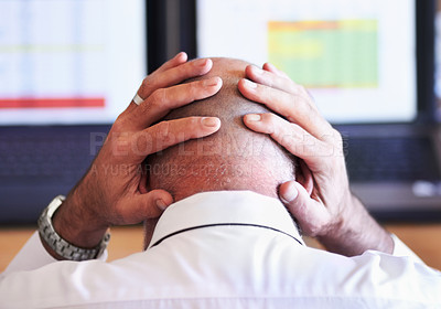 Buy stock photo Rear view shot of a businessman looking stressful while placing his hands behind his head