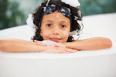 Buy stock photo Portrait, children and bath with a boy in goggles while cleaning his skin in the home for natural hygiene. Face, kids and a happy young child in the bathroom to wash with soap or foam in water