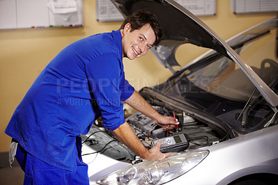 Buy stock photo Portrait, car and repair with a mechanic man in a workshop as an engineer looking at the engine of a vehicle. Garage, service or quote with a young technician working under the hood of an automobile