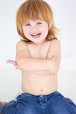 Buy stock photo Young kid, laughing and arms crossed portrait of a toddler in studio with a smile. Ginger infant, laugh and happy in a house with joy and positivity from childhood isolated with white background