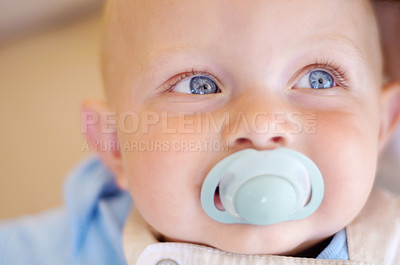 Buy stock photo Newborn, baby pacifier and smile or closeup for comfort, safety or happy place. Child, face and dummy mouth for quiet bed sleep or healthy development or relax calm, support or stress reduce rubber