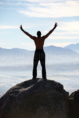Buy stock photo Mountain top, success and back of fitness man stretching arms in nature for performance celebration on sky background. Exercise, freedom and rear view of male athlete with workout, energy or victory