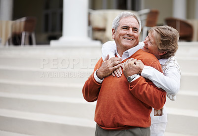 Buy stock photo Hug, retirement and an old couple on hotel steps for travel, vacation or tourism in luxury accommodation. Love, relax or hospitality with a senior man and woman hugging on the staircase of a resort