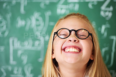 Buy stock photo A cute blonde girl laughing in class