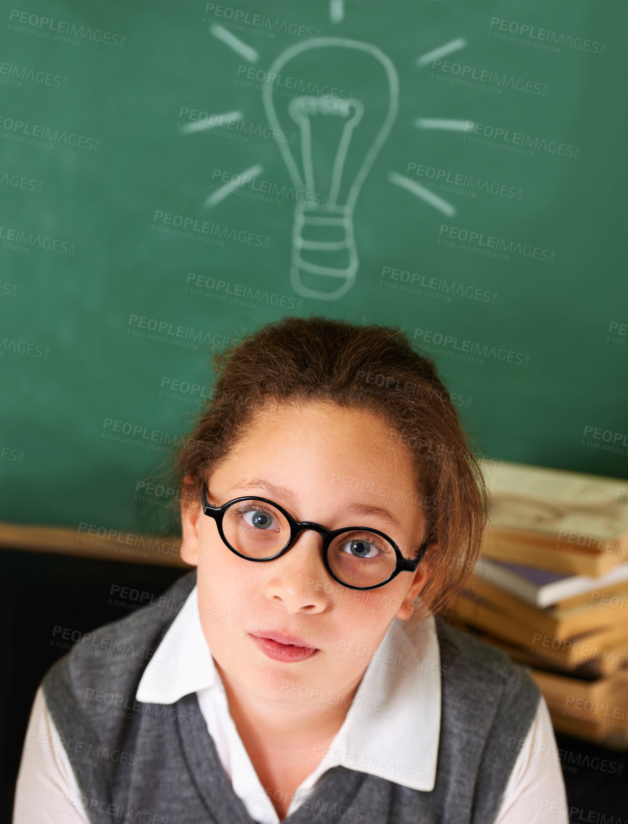 Buy stock photo Thinking, idea and portrait of student with light bulb on board for plan, decision or brainstorming in classroom. Education, learning and girl kid with drawing for choice, vision or future in school.