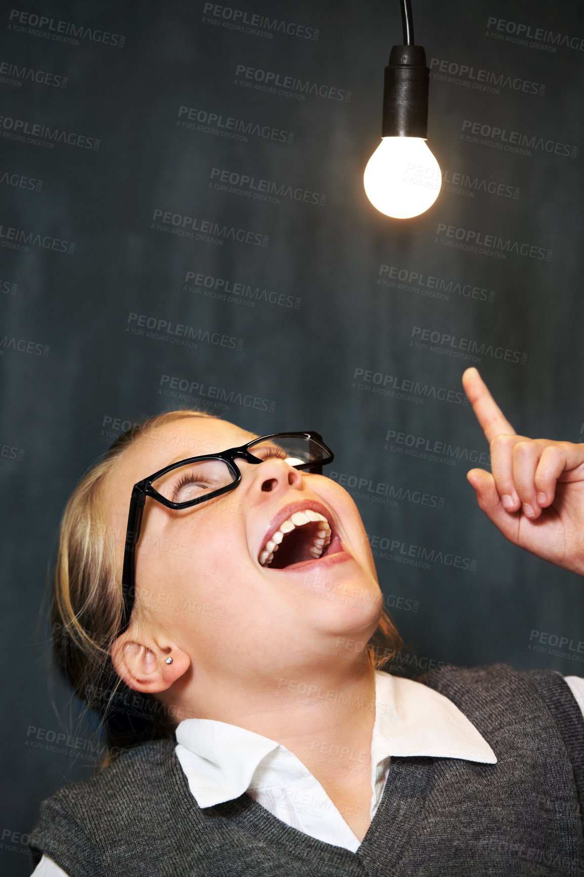 Buy stock photo Student, child and lightbulb for solution, learning and wow, surprise or excited for future, ideas and knowledge in school. Girl kid thinking with light bulb, glow and black chalkboard for vision