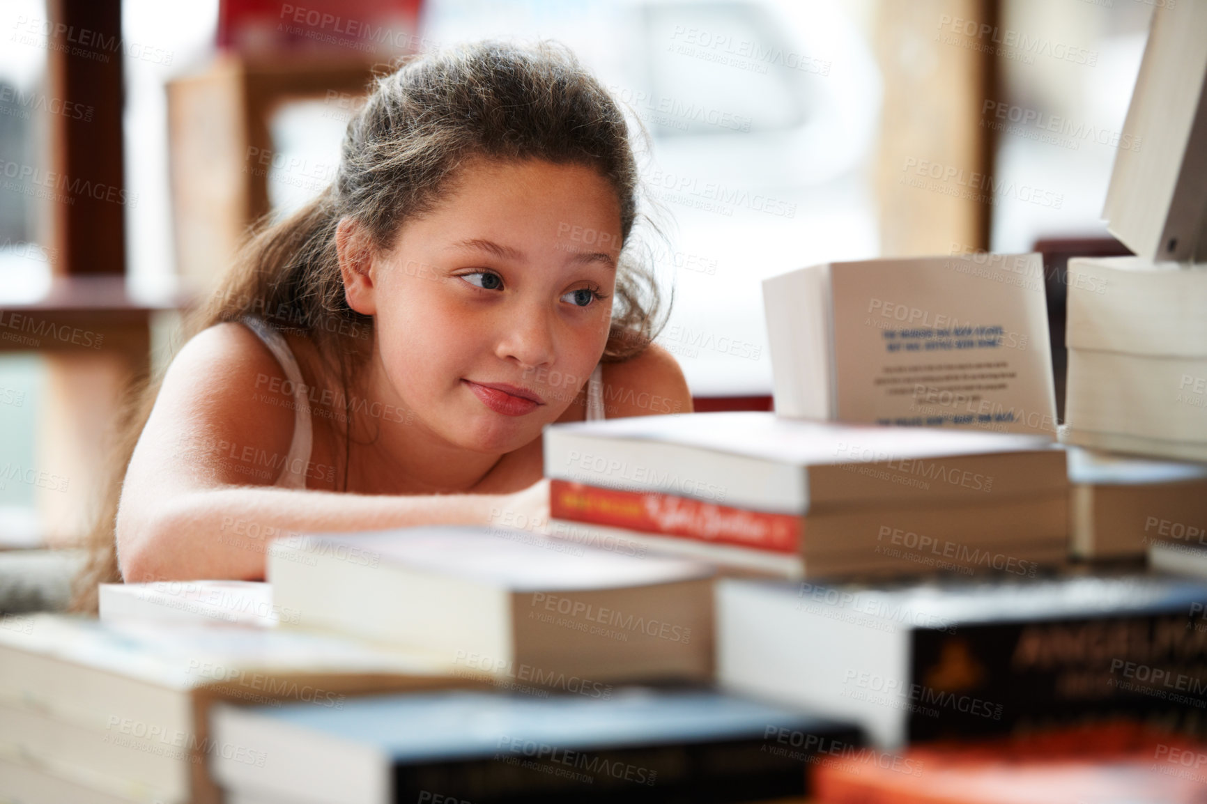 Buy stock photo Girl child, books in library and education, story for knowledge or entertainment with customer in bookshop. Learning for development and growth, fiction or literature with young kid in bookstore
