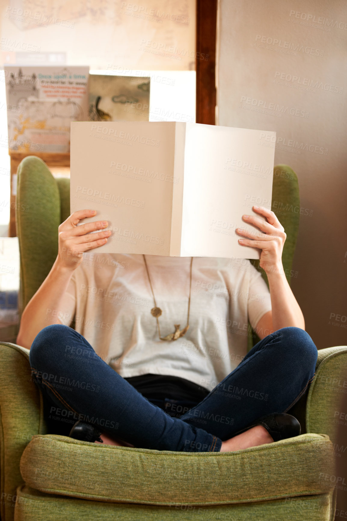 Buy stock photo Person cover face with books in library, bookstore or shop for research, learning and relax on sofa. Literature, knowledge and customer with book for education, information and reading for hobby