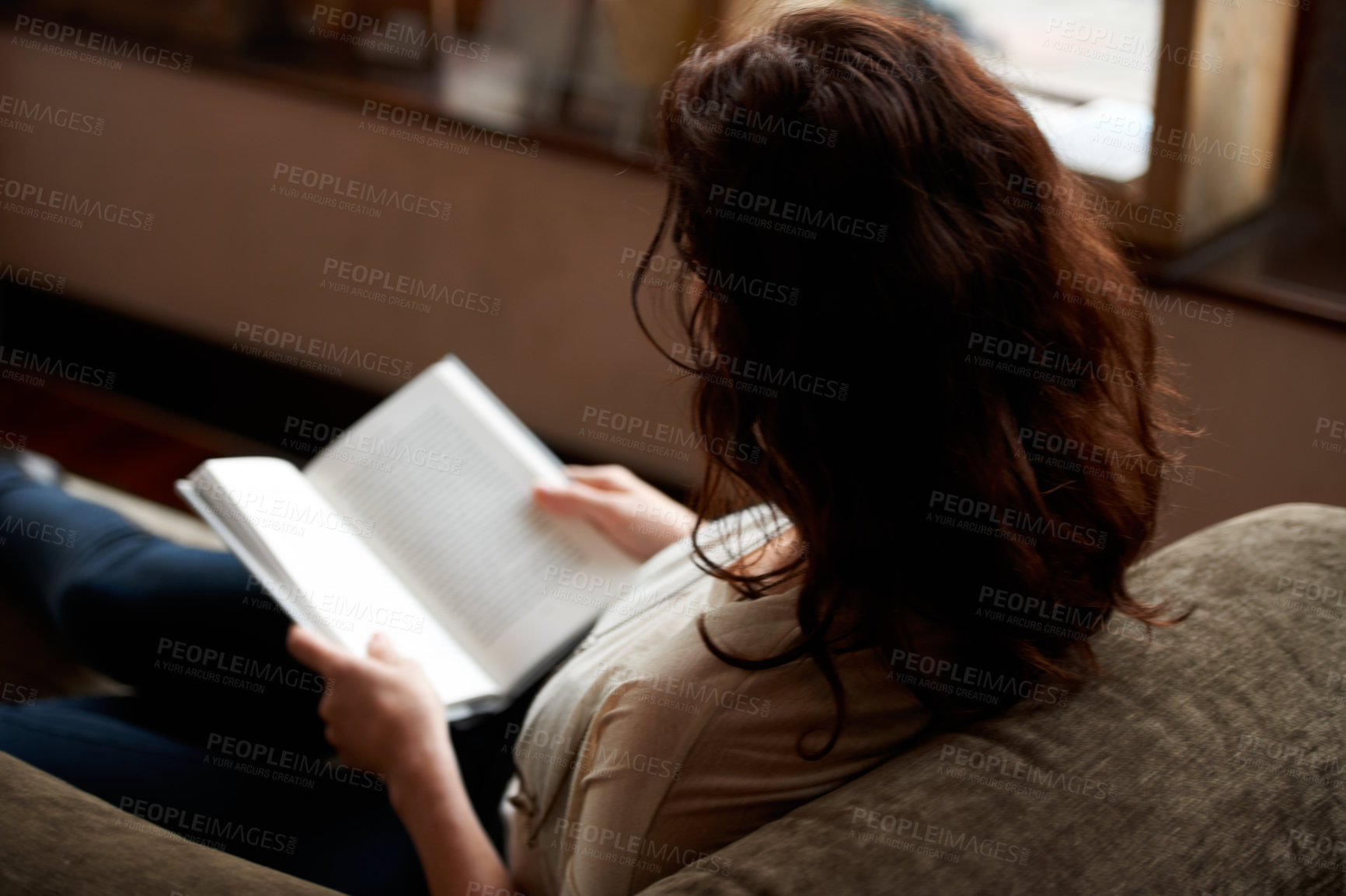 Buy stock photo Reading, books and woman on sofa to relax in bookstore, library or shop for research, learning and study. Literature, knowledge and person with book for education, information and studying for hobby