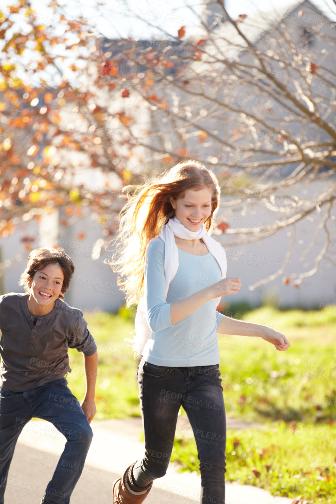 Buy stock photo Woman run, autumn and nature at park with smile and happy from travel, vacation and leaves. Holiday, outdoor and calm female person in New York with freedom and adventure by a tree in a garden 