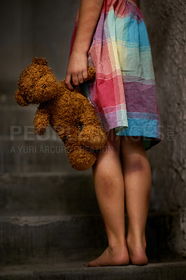 Buy stock photo Cropped view of a little girl holding a teddy bear