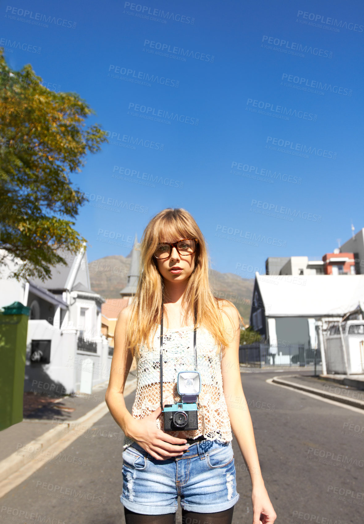 Buy stock photo Travel, photography and portrait of woman with camera for creative and art career in the city. Glasses, gen z and young female person from Australia with dslr equipment on weekend trip in town.
