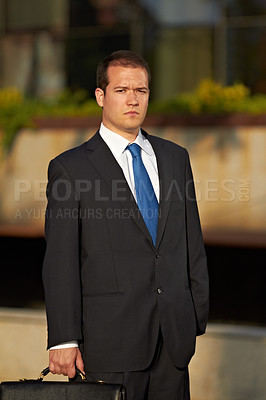 Buy stock photo Portrait, business and man in a city, serious and executive with formal wear, finance and professional. Male person, company director and employee with a briefcase, accounting and financial adviser